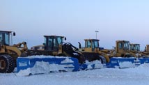 Image of some of Snelten, Inc.'s snow hauling and removal equipment